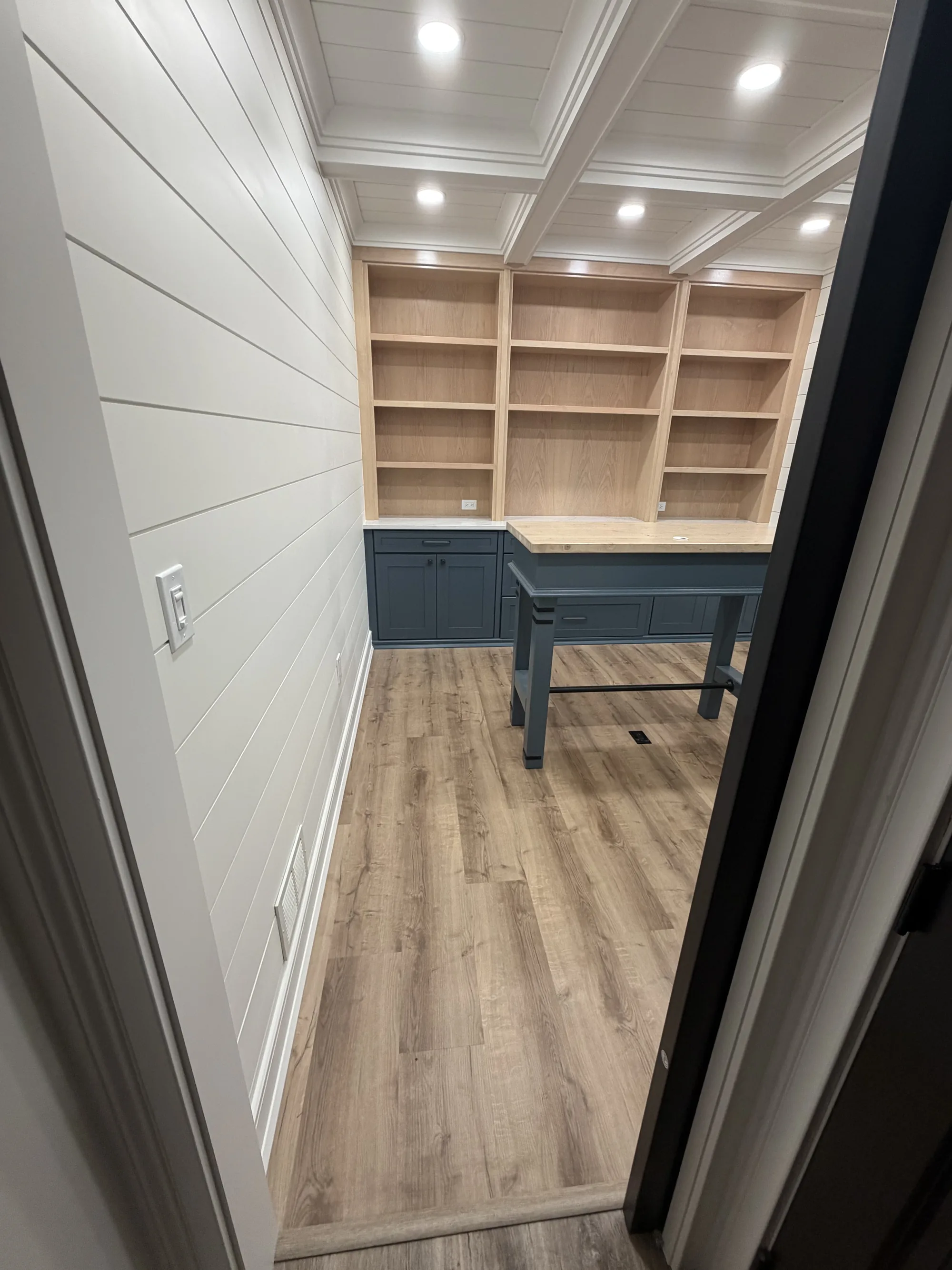Craft Room under a Coffered Ceiling — custom carpentry by Custom Interiors & Remodeling
