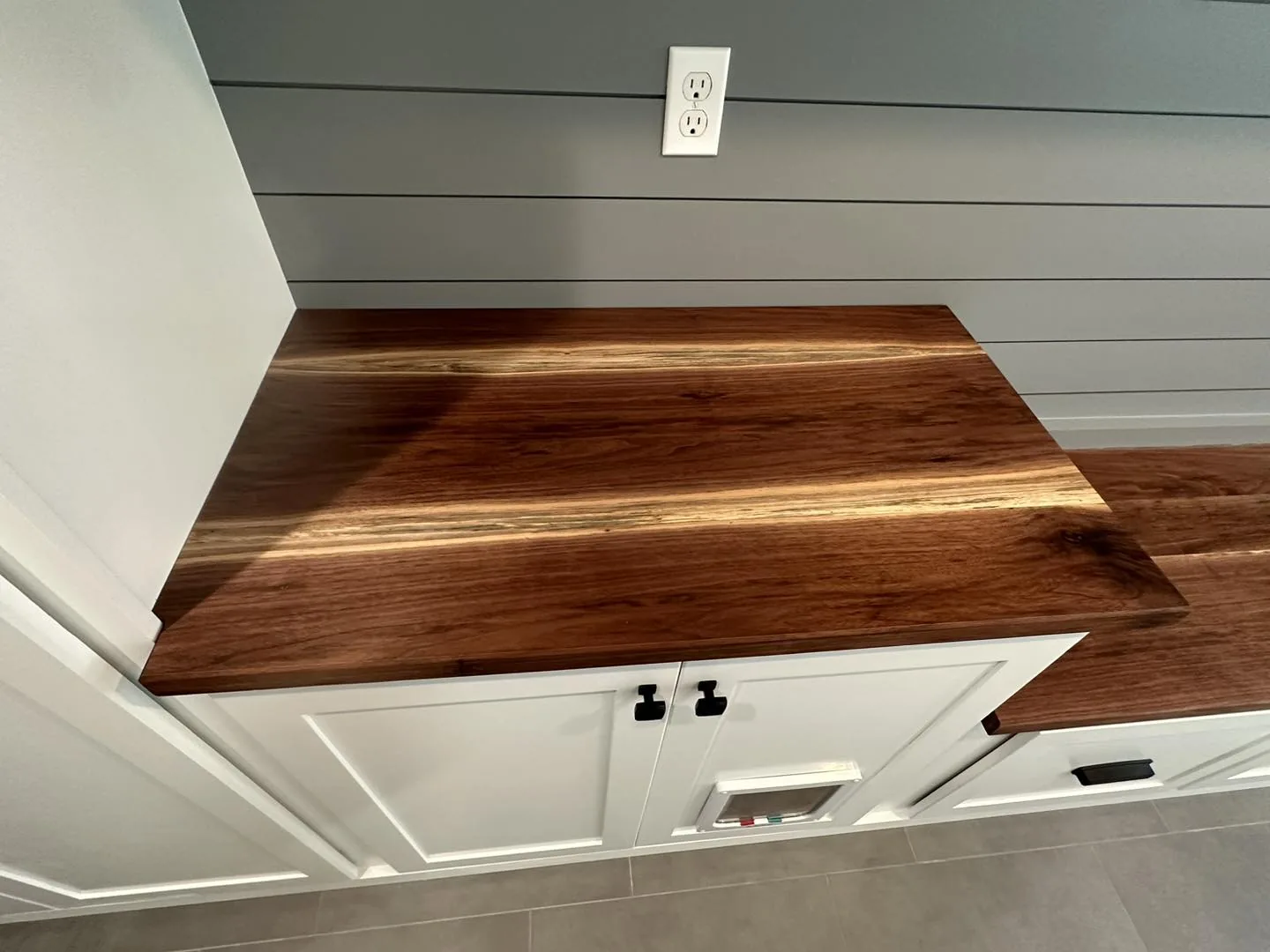 Shiplap Wall & Walnut Mantel — custom carpentry by Custom Interiors & Remodeling