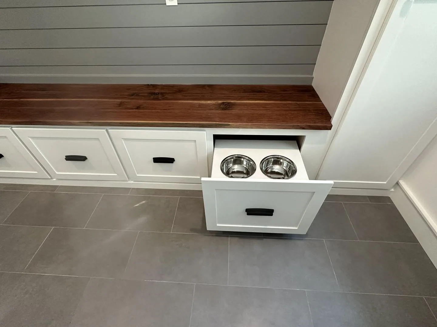 Beamed Ceiling & Window Bench — custom carpentry by Custom Interiors & Remodeling