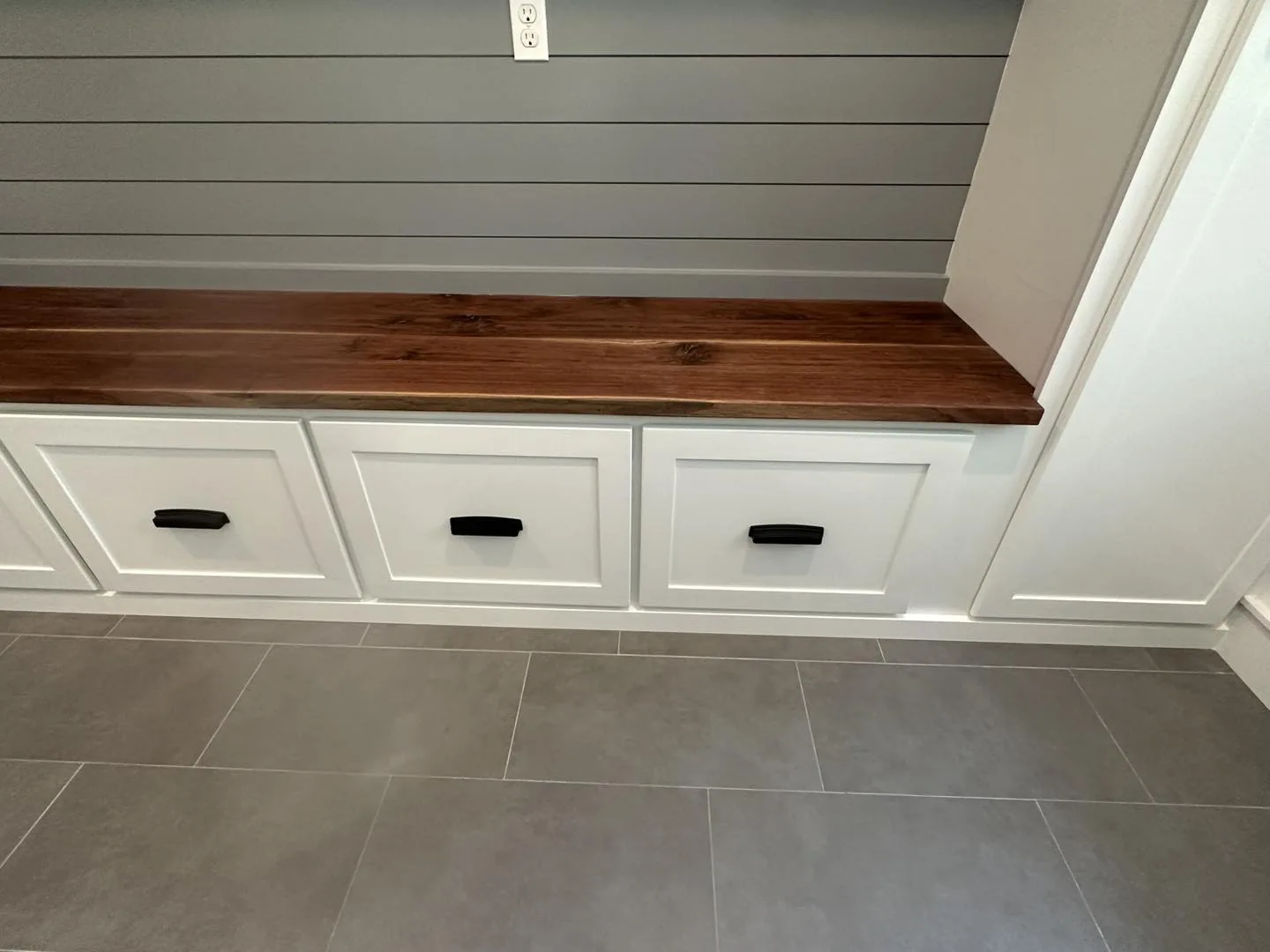 Mudroom Bench in Walnut — custom carpentry by Custom Interiors & Remodeling